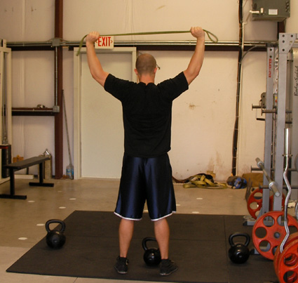 resistance band behind the neck pull aparts video exercise