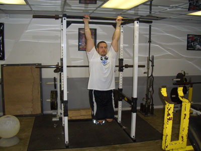 Full rotation hanging knee raise