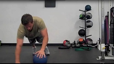 Medicine Ball Alternating Push-up Start Position