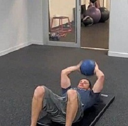 Medicine Ball Crunches Exercise Video Example