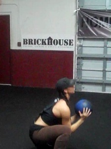 Medicine Ball Squat to Press Start Position