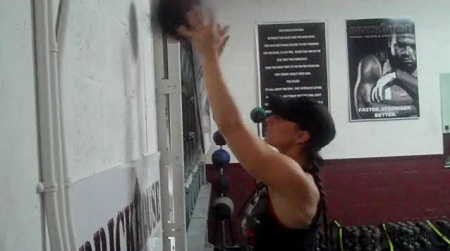 Medicine Ball Tricep Isolation Bounce Finish Position