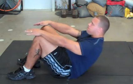 Push Over Knees Sit Ups exercise