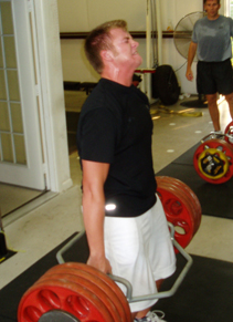 Building Muscle and Grip Strength with Strongman Training