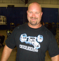 Thomus holds the APA powerlifting record in the 242s