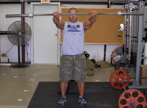 Standing Front Barbell Raise shoulder exercise